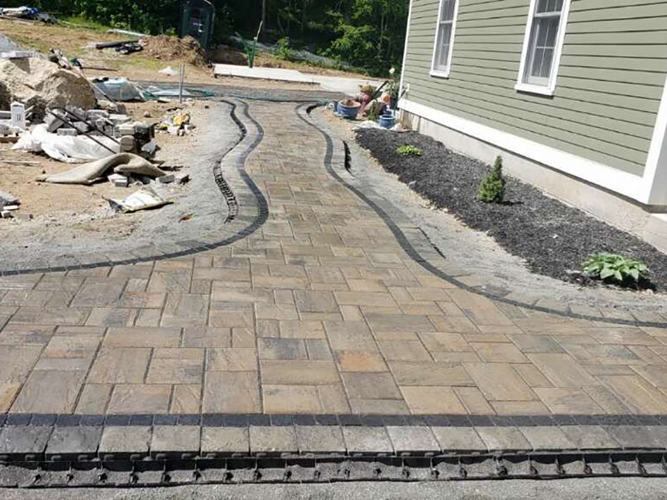 curved walkway by TNT Landscaping & Excavation LLC